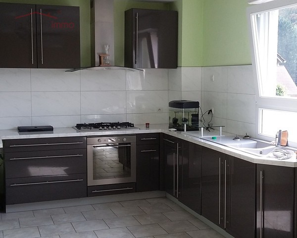 Maison de 5 pièces sur 6.4 ares . - 041