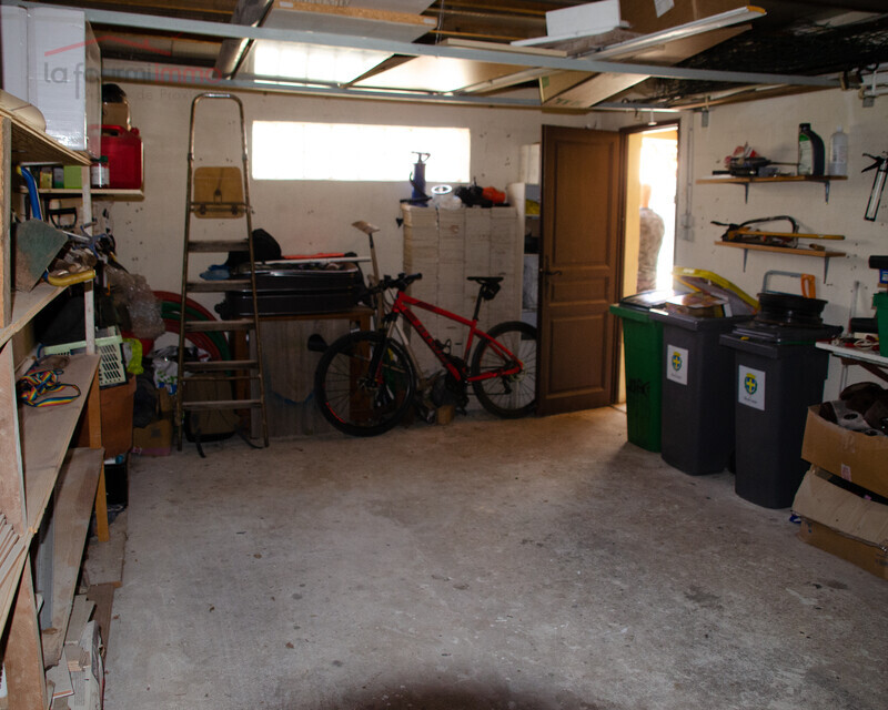 Jolie maison avec jardin et garage - Garage mezzanine