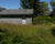 Maison de bourg avec jardin et garage non attenants - Sortie piétonne du garage sur son jardin