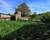 Maison de bourg en pierres avec son petit jardin attenant - Vue de la salle à manger