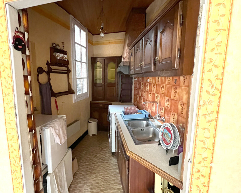 Vends à Boulay un immeuble de 182 m2 avec jardin et garages - Cuisine1
