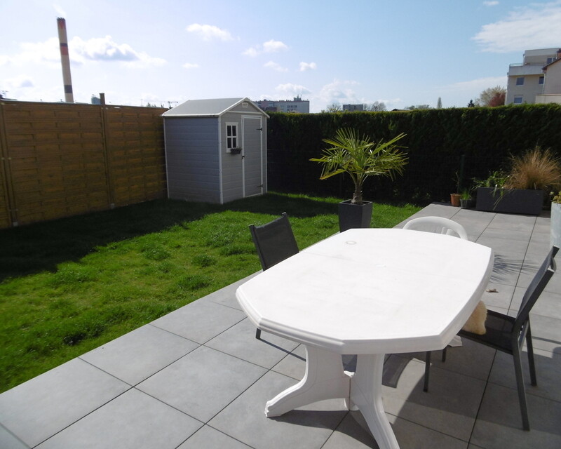 Triplex de 113 m2 avec espace vert, garage, parking et terrasse  - P1010024