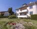   Superficie foncière 808 m² Maison multi projets 221 m² - Photo facade et jardin depuis rue pasteur 2 