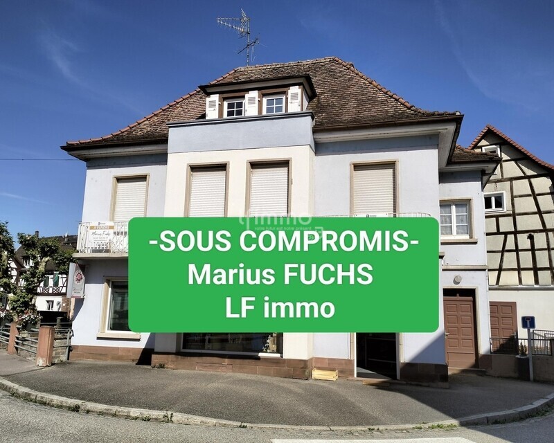 Immeuble avec un local commercial et deux logements - Sous compromis