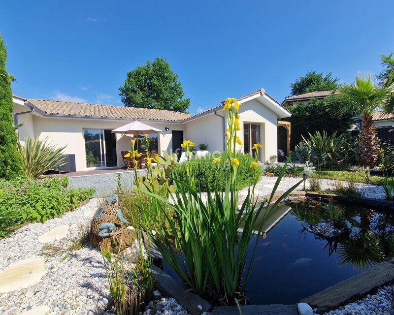 Maison dans quartier recherché - Jardin façade sud