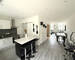 Vends à Boulay, immeuble avec magasin + appart. neuf 100m2  - Vue sur salon cuisine