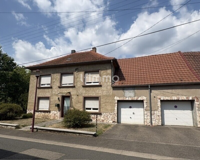 Maison semi mitoyenne côté garage  - Façade km
